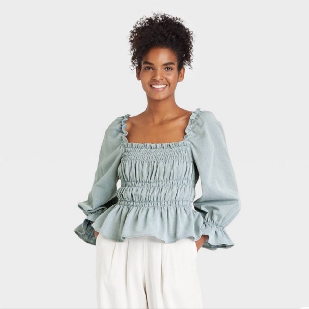 Balloon 3/4 Sleeve Smocked Peplum Top